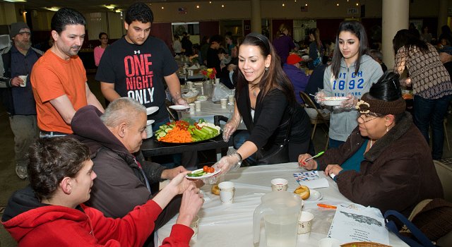 Volunteers serving at the Saint Colman’s Church dinner for the needy