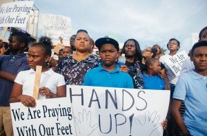 Protesters in Ferguson, MO [photo credit: Jamelle Bouie, via Wikimedia Commons]