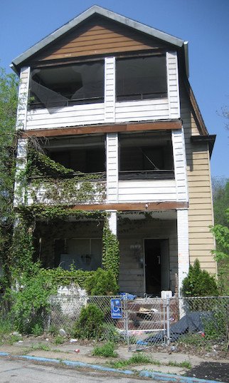 This abandoned home on Cliff Street was previously owned by a hoarder.