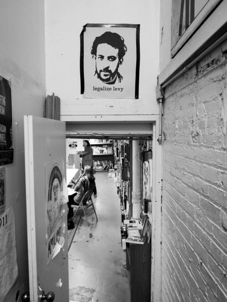 At Mac’s Backs bookstore, the angular vestige of d.a. levy stares down at patrons as they make their way to the basement where poetry readings and workshops often take place.