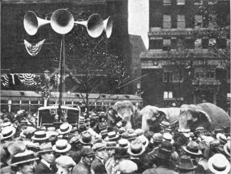 Crowd outside the 1924 Republican National Convention in Cleveland listen to speeches broadcast from inside the hall via an early "public address system." From a 1924 issue of Popular Radio magazine.