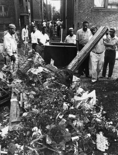 Hough residents clean up after the 1966 riots. Photo: Cleveland State University, Michael Schwartz Library, Cleveland Press Collection.