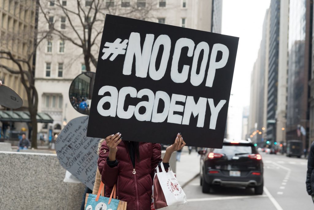 Love + Struggle - No Cop Academy March